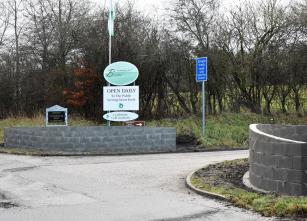 Entrance at foot of road